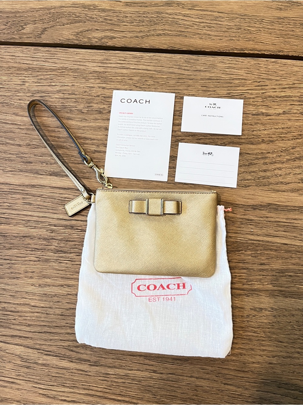 Coach F51672 Darcy Bow Metallic Gold Saffiano Leather Small Wristlet Pouch